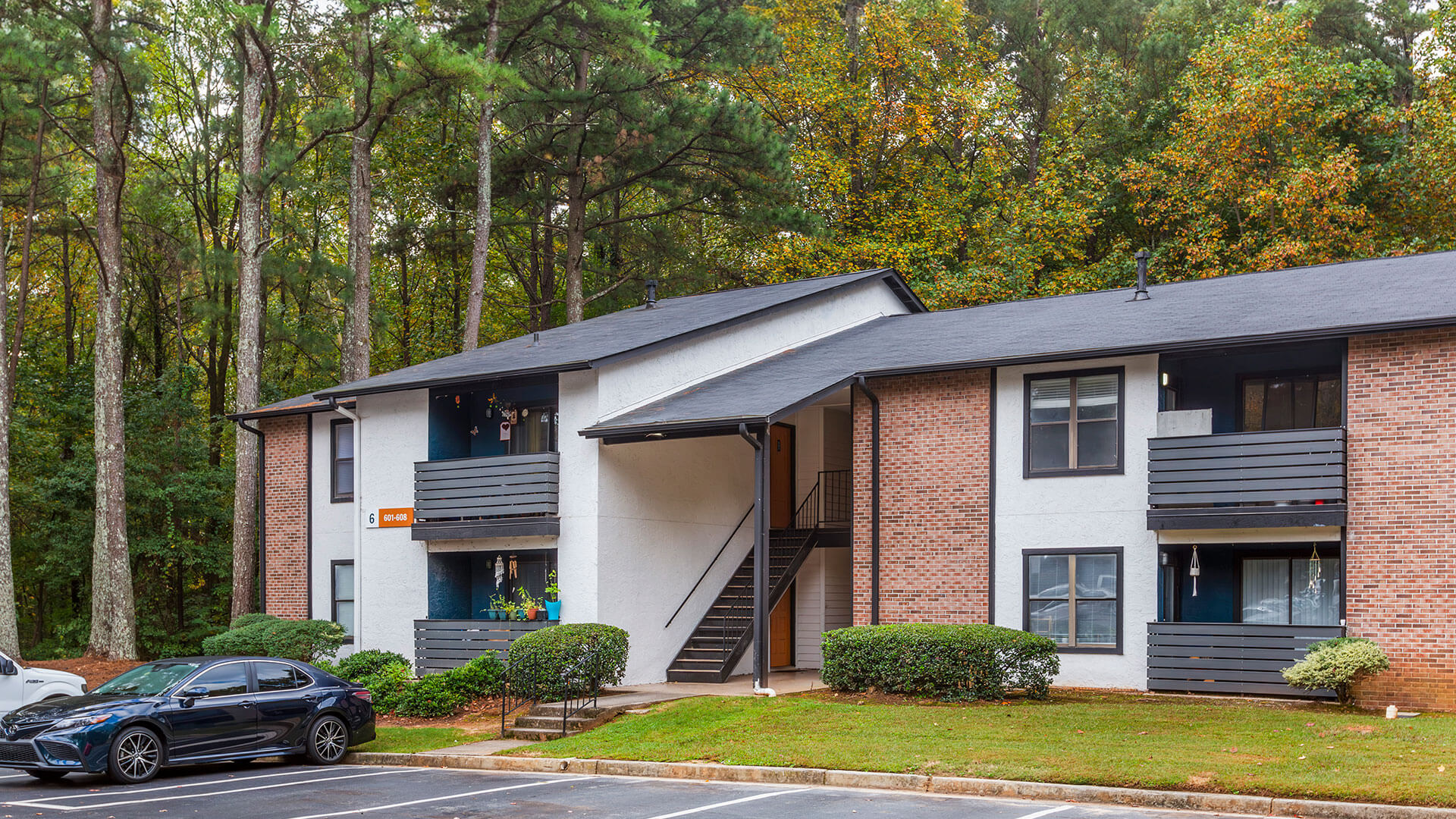 the apartment complex is located in a wooded area at The  Rowen